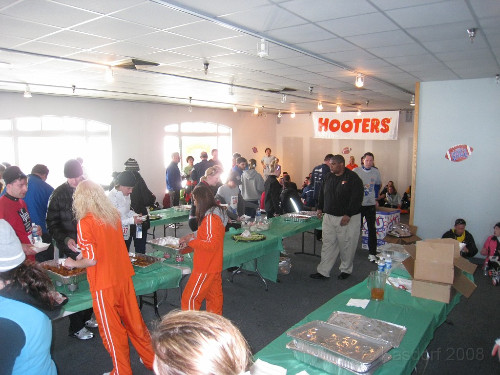 Super 5K 2009 013.jpg - The Hooters girls served up hot wings and small sandwiches.